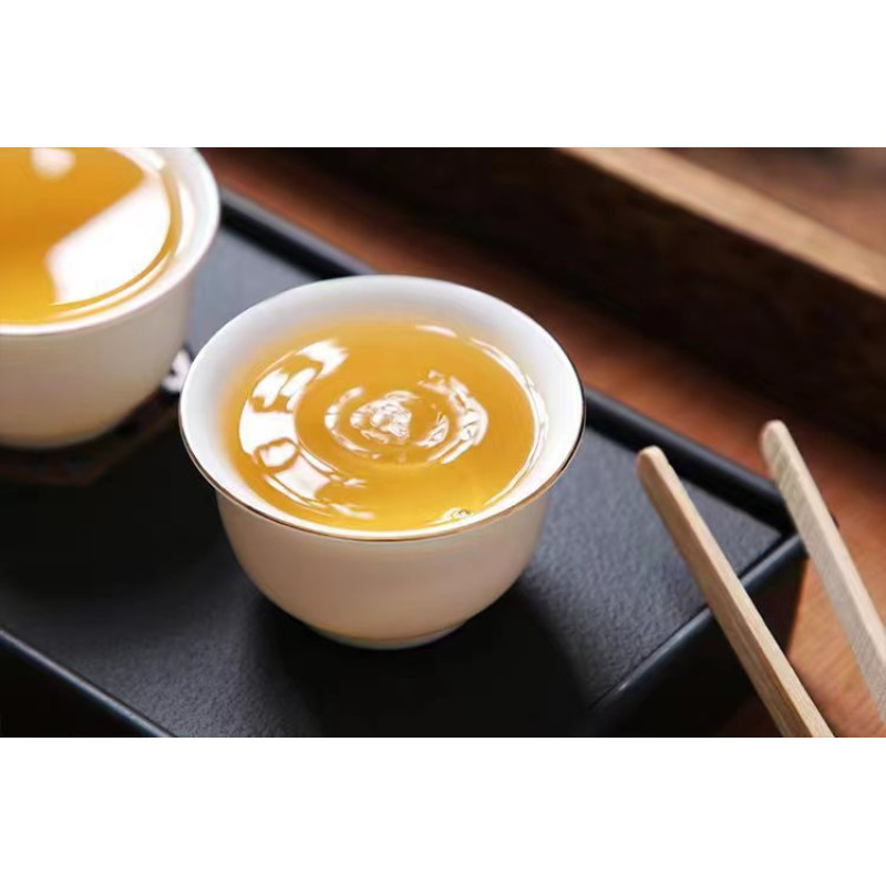 Чай шен пуер з великих дерев "Біндао Золоте Листя", 250 г, пресований чайний брикет