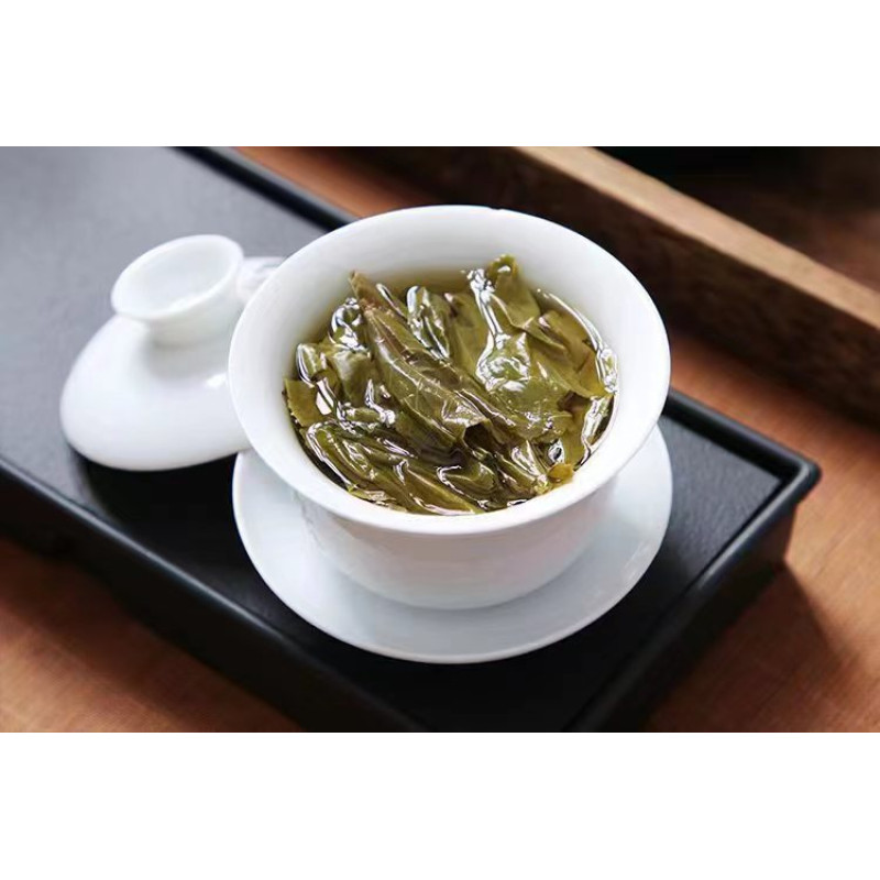 Чай шен пуер з великих дерев "Біндао Золоте Листя", 250 г, пресований чайний брикет