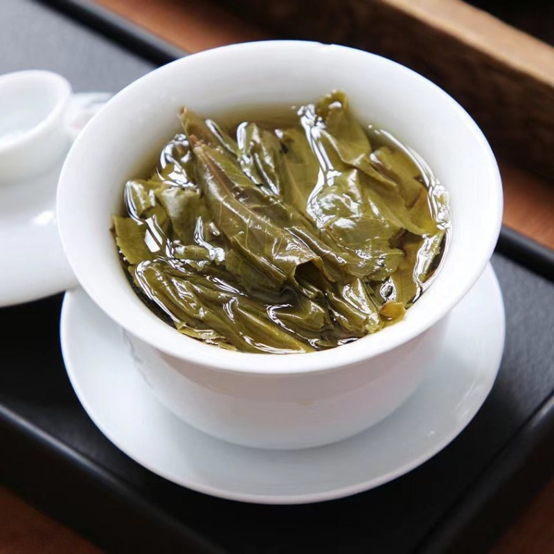 Чай шен пуер з великих дерев "Біндао Золоте Листя", 250 г, пресований чайний брикет