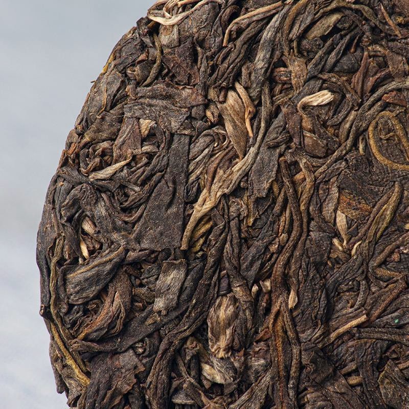 Чай шен пуер "Сяо Ху Сай" (Xiao Hu Sai), 100 г, млинець